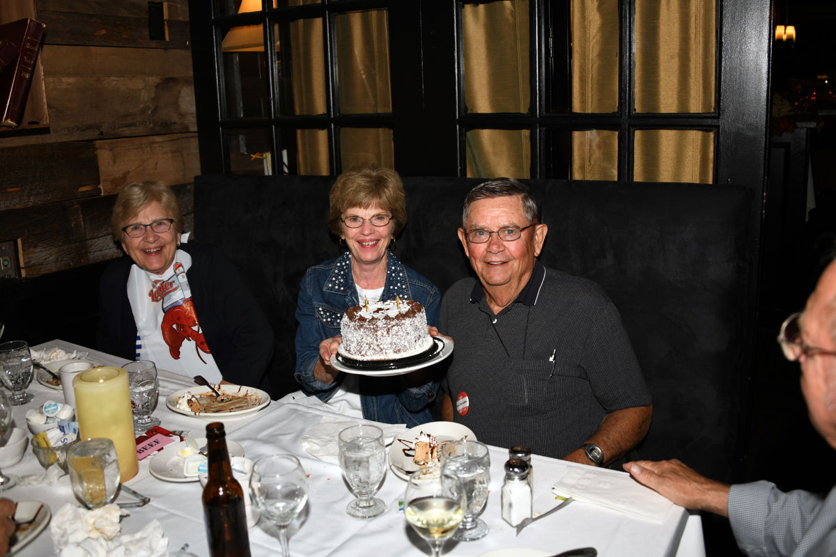 326 Carolyn Hoffman, Mary Jane and Gary Meradith celebrating the Meradith's wedding anniversary..jpg